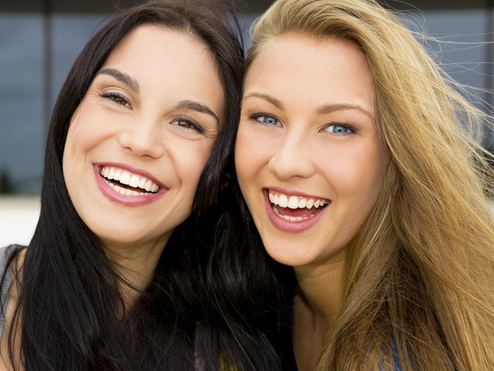 Two smiling women